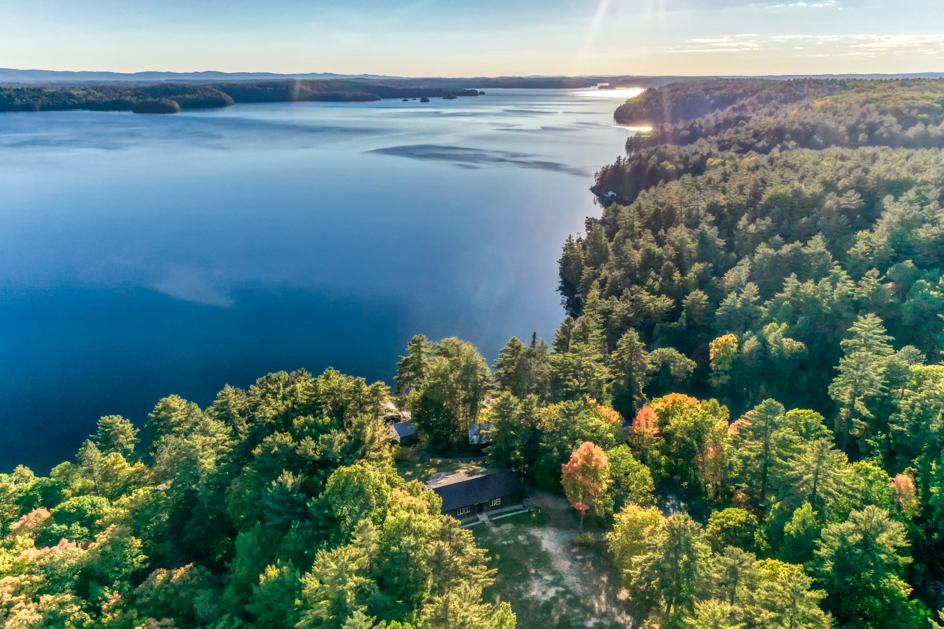 Aerial view looking across Lake Panache toward the wooded shoreline near 103A North Shore Road